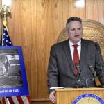 At a news conference at the Alaska State Capitol on Tuesday, March 8, 2022, Gov. Mike Dunleavy outlined his plan to have the state divest its assets from Russia. The disruption in the global market could be beneficial to Alaska, the governor said, if it is able to develop its resources. (Peter Segall / Juneau Empire)