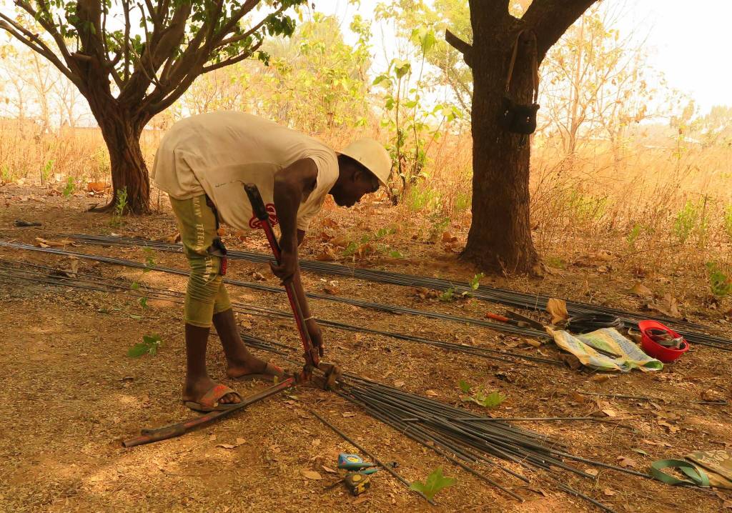 Courtesy photo / Mary McEwen 
A builder works on a new secondary school thats going up in the village of Dimori in Togo with help from a Juneau woman who used to live in there.