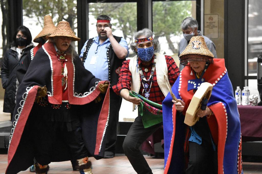 Dancers concluded a ceremony re-installing a totem pole in the attrium of the State Office Building on Friday, March 11, 2022.