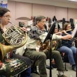 Kristine Paulick and Bill Paulick rehearse in a music classroom in Dzantiki Heeni Middle School ahead of an upcoming Juneau Community Bands Horns A-Plenty concert set for Sunday at Thunder Mountain High School. (Ben Hohenstatt / Juneau Empire)