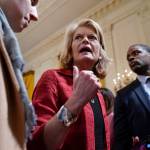 Sen. Lisa Murkowski, R-Alaska, talks with a reporter after attending at an event to celebrate the reauthorization of the Violence Against Women Act in the East Room of the White House, Wednesday, March 16, 2022, in Washington. Murkowski spoke the the Alaska House of Representatives Special Committee on Tribal Affairs Thursday about what the bill means for Alaska. (AP Photo/Patrick Semansky)