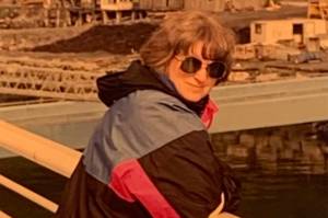 Laura Rorem stands on a ferry retreat circa 2004. (Courtesy Photo )