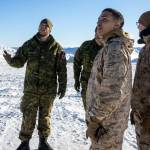 Canadian Army Master Bombardier Ian Frank, a radar detachment commander with 128 Battery, 4th Artillery Regiment, explains his units operations in Exercise Arctic Edge 2022, to U.S. Marine Corps food specialists, with 2nd Landing Support Battalion, on Eielson Air Force Base, Alaska, March 15, 2022. (U.S. Marine Corps / Lance Cpl. Jessica J. Mazzamuto)