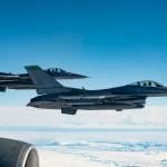 Two U.S. Air Force F-16 Fighting Falcons, assigned to the 180th Fighter Wing, fly in formation after being refueled by a KC-135 Stratotanker, assigned to the 97th Air Refueling Squadron, during U.S. Northern Command Exercise Arctic Edge 2022, March 15, 2022. (U.S. Air Force / Staff Sgt. Taylor Crul)