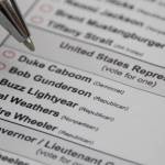 A would-be voter considers the candidates on a sample ballot released by the state of Alaska in March 2021. The Alaska Division of Elections has announced the dates for the special elections to select a replacement for Rep. Don Young, R-Alaska, who died recently. (Ben Hohenstatt / Juneau Empire file)