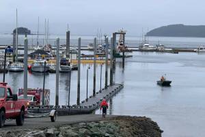 Capital City Fire/Rescue personnel participate in the rescue of a capsized kayaker near Don D. Statter Harbor on March 21, 2022. (Courtesy photo / CCFR)