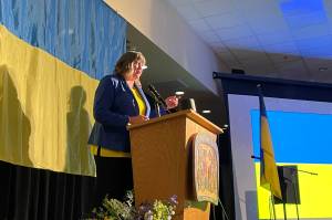 Rep. Sara Hannan (D-Juneau) speaks during a Friday fundraising dinner and silent auction for the people of Ukraine at Elizabeth Peratrovich Hall which raised more than $30,000. (Michael S. Lockett / Juneau Empire)