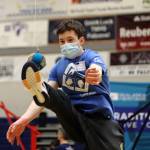 Augustin Greetham, 14, of White Horse connects with his target during one-foot high kick at the 2022 Traditional Games held Saturday at Thunder Mountain High School. (Ben Hohenstatt / Juneau Empire)