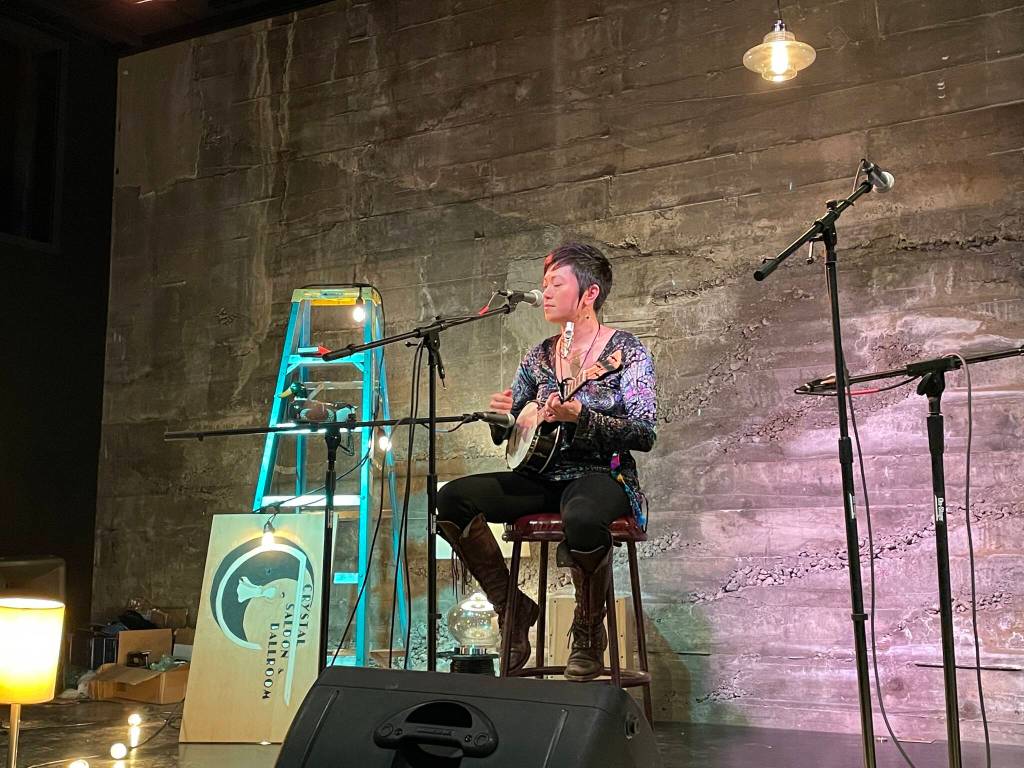 Lisa Puananimohalaikalani Denny plays a set at the Crystal Saloon during one of the many music shows that occur adjacent to the 2022 Alaska Folk Festival on April 4, 2022. (Michael S. Lockett / Juneau Empire)