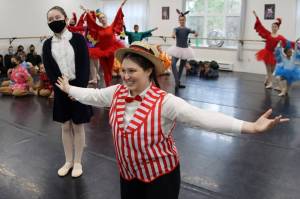 Nora (Ginger Patterson) and the Proprietor (Adara Allen) stand at the forefront of a wide assortment of critters, including, a macaw (Georgia Post) and a donkey (Elizabeth Eriksen). (Ben Hohenstatt / Juneau Empire)