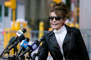 Former Alaska Gov. Sarah Palin speaks briefly to reporters as she leaves a courthouse in New York, Feb. 14, 2022. Palin is one of 48 candidates for Alaska's lone U.S. House seat, which was held for decades by Republican Rep. Don Young, who died last month. Palin says she's serious about the run though some critics have questioned her motivations. (AP Photo / Seth Wenig)