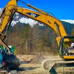 Joe Shockley prepares a car for baling at Skookum Recycling on April 19, 2022. Skookum is partnered with the City and Borough of Juneau to dispose of junk cars for free for the first 50 registrants beginning on April 22, 2022. (Michael S. Lockett / Juneau Empire)