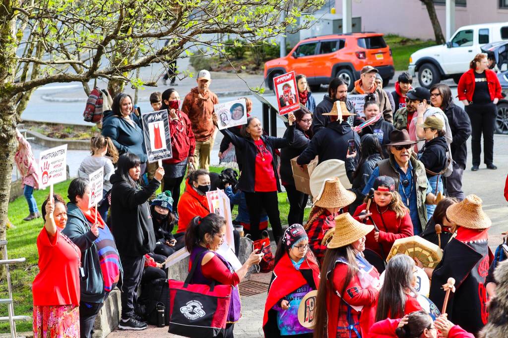 Rally-goers drum before the annual Missing and Murdered Indigenous Persons rally at the Alaska State Capitol on May 5, 2022. (Michael S. Lockett / Juneau Empire)