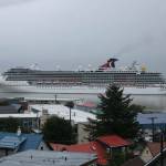 A Carnival Cruise Lines vessel similar to one due in Juneau Saturday following a COVID-19 outbreak aboard steams past Douglas in 2021. (Dana Zigmund / Juneau Empire File)