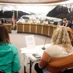 Juneau School District Superintendent Bridget Weiss, right, and other district leaders present a request for extra funding for middle school wrestling mats to the Juneau Assembly’s Finance Committee on Wednesday. The request was first requested Monday by a wrestling coach who stating student safety is endangered by the aging and damaged mats currently in use, but the committee rejected the request due to concerns about a deficit in next year’s budget and worries about motivating others to make similar last-minute requests. (Mark Sabbatini / Juneau Empire)