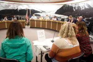 Juneau School District Superintendent Bridget Weiss, right, and other district leaders present a request for extra funding for middle school wrestling mats to the Juneau Assembly’s Finance Committee on Wednesday. The request was first requested Monday by a wrestling coach who stating student safety is endangered by the aging and damaged mats currently in use, but the committee rejected the request due to concerns about a deficit in next year’s budget and worries about motivating others to make similar last-minute requests. (Mark Sabbatini / Juneau Empire)