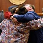 Alaskans for Better Government members La quen náay Liz Medicine Crow, Richard Chalyee Éesh Peterson and ‘Wáahlaal Gidáak Barbara Blake embrace on the floor of the Alaska State Senate on Friday, May 13, 2022, following the passage of House Bill 123, a bill to formally recognize the state's 229 already federally-recognized tribes. (Peter Segall / Juneau Empire)