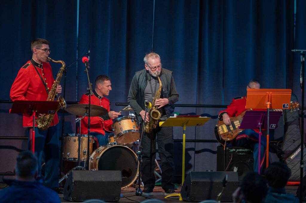 Jon Haywood, a longtime Juneau resident, takes center stage with his 1940s alto saxophone for a performance of the jazz standard Four during a jam session with The Presidents Own U.S. Marine Jazz Band at the Juneau Arts and Culture Center on Wednesday. (Courtesy Photo)