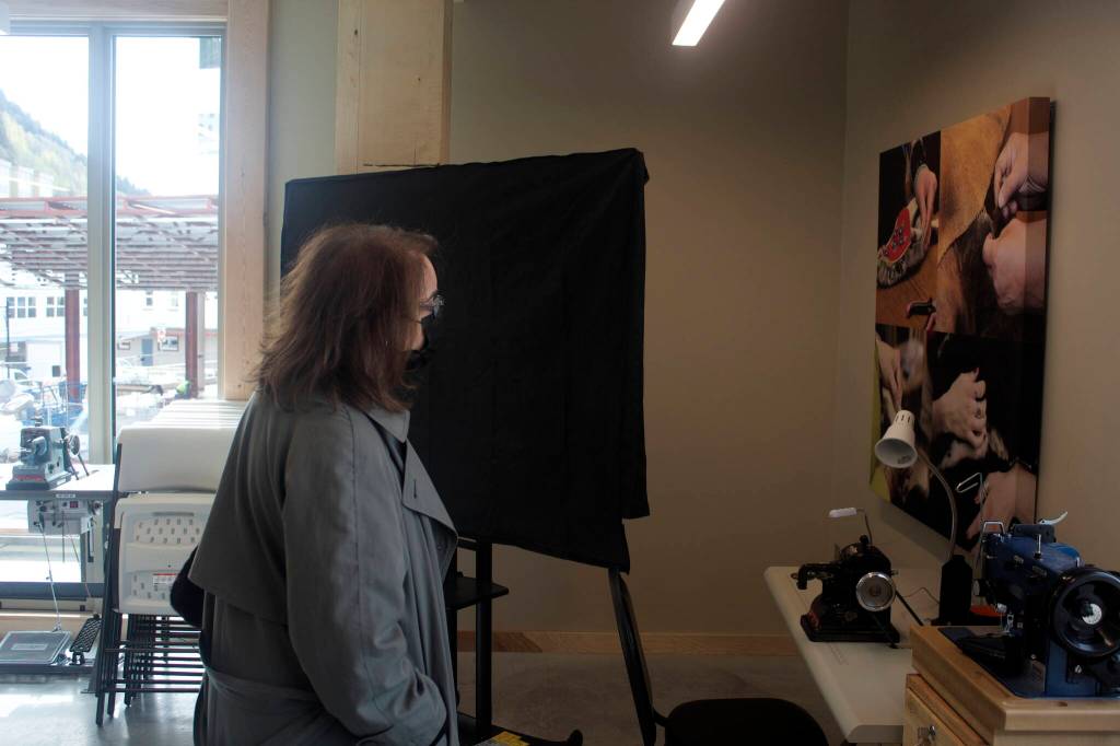Assistant U.S. Commerce Secretary Alejandra Castillo views Native art inside the Sealaska Heritage Plaza campus building still under construction during her visit to Juneau on Wednesday. (Mark Sabbatini / Juneau Empire)