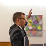 Public defender Nicolas Ambrose gestures during a trial centered around a 2019 stabbing May 19, 2022. (Michael S. Lockett / Juneau Empire)