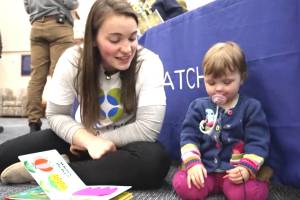 Shawen Bueckers, left, meets the girl who she donated bone marrow to, Amelia Bellmore, at a Be the Match event at Brigham Young University in 2022. (Screenshot)