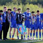 TMHS seniors don Class of 2022 glasses during a group photo ahead of Saturdays game. The seniors, Bryce Albay, Omar Alvarez, Miguel Romero, Jaden White, Miles Peterson, Darin Tingey, Wallace Adams, Talon Briggs, Phillip Lam, Ammon Kawakami, John Magalhaes, Cade Babcock and Seth Shannara (not pictured) will play their next game at state. (Ben Hohenstatt / Juneau Empire)