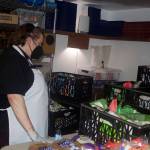 Resurrection Lutheran Church Pastor Karen Perkins looks for infant and other supplies available at the churchs weekly food pantry on Monday. She said the church was receiving regular donations of formula from Valley Medical Care until a couple of months ago when the nationwide crisis hit, with the only supplies now being sporadic donations from parishioners and others involved in the food pantry. (Mark Sabbatini / Juneau Empire)