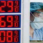 High gas prices are seen in front of a medical billboard on May 11, 2022, in Milwaukee. Americans are becoming less supportive of punishing Russia for launching its invasion of Ukraine if it comes at the expense of the U.S. economy, a sign of rising anxiety over inflation and other challenges. Thats according to a new poll from The Associated Press-NORC Center for Public Affairs Research. (AP Photo / Morry Gash)