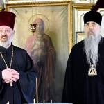 Reverend Father Simeon Johnson, the rector for St. Nicholas Russian Orthodox Church, left, stands in the church chapel with the recently enthroned Bishop of the Russian Orthodox Diocese of Sitka and Alaska, the Right Reverend Alexei on Wednesday, May 25, 2022. Alexei was in Juneau to discuss rennovations to St. Nicholas, the second oldest Orthodox church in Alaska. (Peter Segall / Juneau Empire)