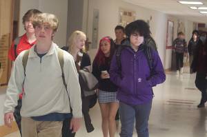 Students at Juneau-Douglas High School: Yadaa.at Kalé go through the hallways mostly without face masks during a break between classes in April shortly after the Juneau Board of Education ended a mask mandate. The decision was controversial due to concerns by some people that events such as proms and graduation ceremonies could become spreader events for COVID-19. (Mark Sabbatini / Juneau Empire)