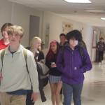 Students at Juneau-Douglas High School: Yadaa.at Kalé go through the hallways mostly without face masks during a break between classes in April shortly after the Juneau Board of Education ended a mask mandate. The decision was controversial due to concerns by some people that events such as proms and graduation ceremonies could become spreader events for COVID-19. (Mark Sabbatini / Juneau Empire)