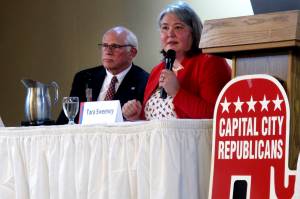 Republican Tara Sweeney, right, speaks Monday, May 16, 2022, at a forum in Juneau, Alaska, that was also attended by three other Republican candidates for Alaska's U.S. House seat, including John Coghill, left. Sweeney and Coghill are among 48 candidates in a June 11 special primary for the House seat left vacant by the death earlier this year of Republican Rep. Don Young. (AP Photo/Becky Bohrer)