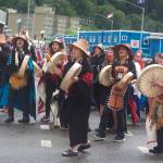 A group of women drummers nears the end of the Celebration parade route at the turnoff to Centennial Hall on Saturday. The four-day Alaska Native gathering is marking its final day with events at the hall including an afternoon of dances, a screening a film commemorating Celebration’s 40-year anniversary and the Grand Exit. (Mark Sabbatini / Juneau Empire)