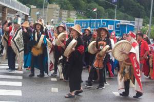 A group of women drummers nears the end of the Celebration parade route at the turnoff to Centennial Hall on Saturday. The four-day Alaska Native gathering is marking its final day with events at the hall including an afternoon of dances, a screening a film commemorating Celebration’s 40-year anniversary and the Grand Exit. (Mark Sabbatini / Juneau Empire)