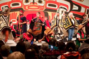 Alaska Native dancers gather for a final time on the stage at Centennial Hall for the Grand Exit of this years four-day Celebration. (Mark Sabbatini / Juneau Empire)