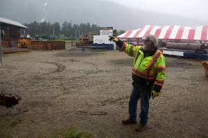 Jerry Harmon, president of Juneau Gold Rush Days and a miner for more than 40 years, shows some of the nearly 500,000 pounds of heavy equipment being brought to Savikko Field for this weekend’s events. The event has attracted more than 10,000 people at its peak, but was cancelled the past two years due to the COVID-19 pandemic. (Mark Sabbatini / Juneau Empire)