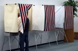 A voter fills out their ballot at the Alaska Division of Elections Region I offices in the Mendenhall Valley for the special primary election to replace the late Rep. Don Young, R-Alaska, on Saturday, June 11, 2022. The Division released updated results Wednesday, but there were no changes to the ranking of the canidates. (Ben Hohenstatt / Juneau Empire)
