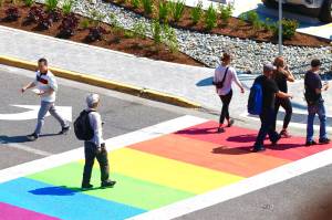 Michael S. Lockett / Juneau Empire
Pedestrians cross the newly repainted rainbow crosswalk downtown on Thursday, June 16, 2022. Painting of the crosswalk was delayed by supply chain issues.