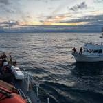 Coast Guardsmen aboard the cutter Liberty, recently re-homeported from Juneau to Valdez, take the vessel Nine Lives under tow after fuel contamination rendered its engine nonfunctional on Tuesday, June 14, 2022. (Courtesy photo / U.S. Coast Guard)