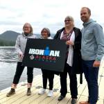 Travel Juneau CEO and President Liz Perry, Sealaska Heritage Institute President Rosita Worl, City and Borough of Juneau Mayor Beth Weldon, and Ironman regional director Dave Christen hold a sign for the 2022 Juneau Ironman event as they announce the races Alaska debut on the University of Alaska- Southeast campus on Aug. 9, 2021. (Michael S. Lockett / Juneau Empire File)