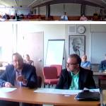 Eric Billingsley, bottom left, president of Nana Management Services and Derrell Webb, the companys vice president of operations, food and facilities management, explain how floor sealant was served instead of milk this week to 14 participants in a local summer youth program during a special Juneau Board of Education meeting on Friday. The meeting was available to the public via Zoom, with parents of five students who drank the chemical testifying. (Screenshot)