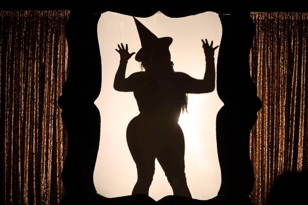 Frankie Doom, a headliner and specialist in macabre drag costuming, prepares to make entrance at Glitz, a major annual drag event celebrated every Pride Month, at Centennial Hall on June 18, 2022. (Michael S. Lockett / Juneau Empire)