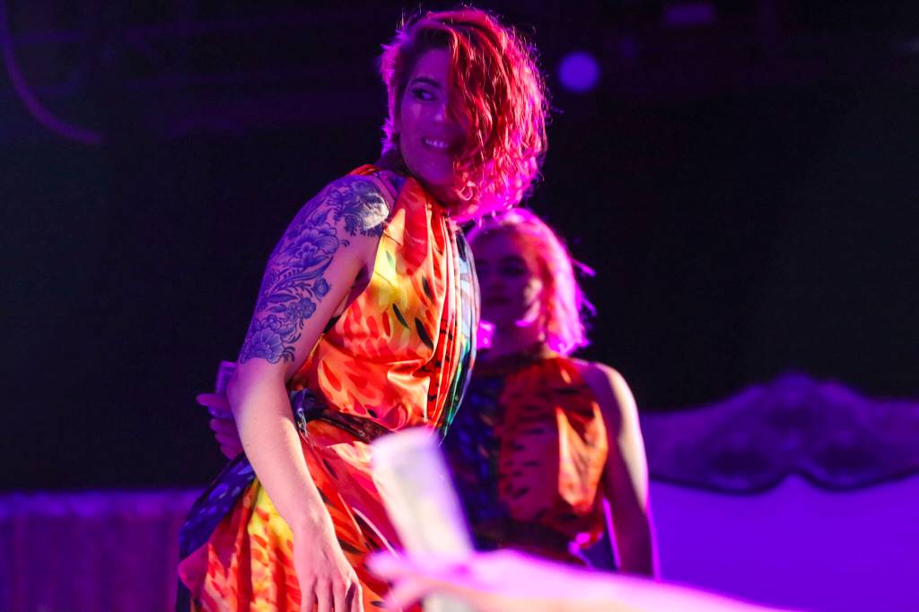 Dancers for Aquarius Valentine look on during their set at Glitz, a major annual drag event celebrated every Pride Month, at Centennial Hall on June 18, 2022. (Michael S. Lockett / Juneau Empire)