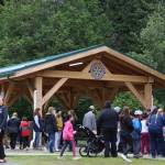 Over 100 people gathered Wednesday evening for the unveiling of a new pavilion at Riverside Rotary Park. (Clarise Larson / Juneau Empire)