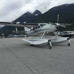 An Alaska Seaplanes Cessna 208A, seen here on the tarmac, suffered damage after failing to achieve takeoff near Elfin Cove on Sunday, June 26, 2022. (Courtesy photo / Alaska Seaplanes)