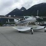 An Alaska Seaplanes Cessna 208A, seen here on the tarmac, suffered damage after failing to achieve takeoff near Elfin Cove on Sunday, June 26, 2022. (Courtesy photo / Alaska Seaplanes)