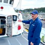 Lt. j.g. Kane Alletzhauser, commanding officer of the U.S. The U.S. Coast Guard Cutter Reef Shark, points out the damage control locker aboard the patrol vessel on June 29, 2022. (Michael S. Lockett / Juneau Empire)