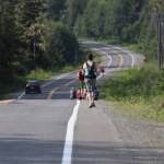 Runners pound up Fish Creek Road towards the ski area during the Eaglecrest Road and Ridge Race on July 2, 2022. (Michael S. Lockett / Juneau Empire)