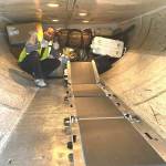 Happy ramp agent featured in good spirits as Fultons TISABAS does the labor intensive part of loading the aircraft. (Courtesy photo / Ramper Innovations)