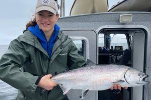 The authors wife with her first keeper king salmon of the 2022 season. (Jeff Lund / For the Juneau Empire)